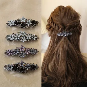 Elegant vintage floral hair clips set with rhinestones for a stylish ponytail look