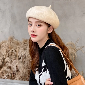 Women's minimalist wool beret in cream white, stylish fall winter artist hat accessory