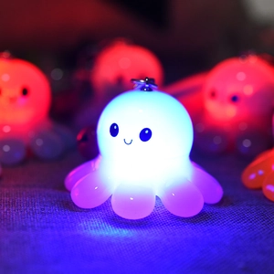 Glow-in-the-dark acrylic octopus keychain with creative LED light and cartoon design