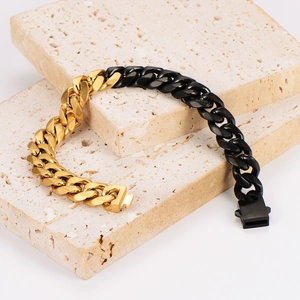 Two-tone Cuban link bracelet in polished gold and matte black finish for men