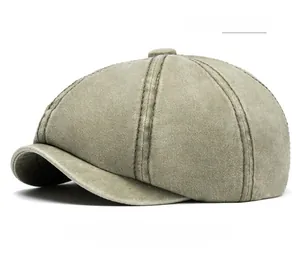 Detailed view of army green newsboy cap made from high-quality washed cotton fabric