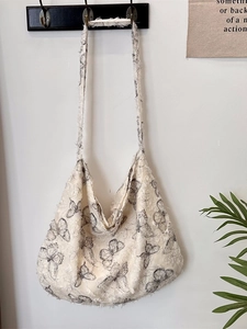 Lace butterfly shoulder bag with fringe trim in a large capacity bohemian style