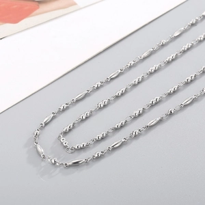 Minimalist silver stainless steel bead necklace featuring polished oval and round links
