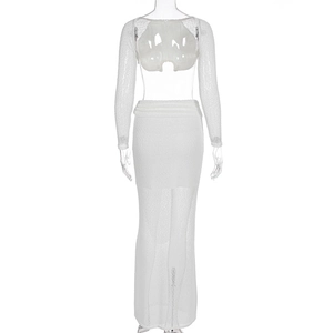 Detailed back view of white long sleeve crop top and skirt with subtle pearlescent texture