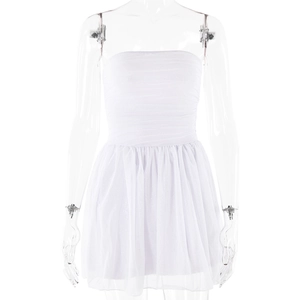 Detail showing white strapless dress with mesh paneling and subtle glitter fabric texture
