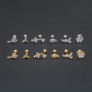 Set of silver and gold geometric helix earrings with fishtail and flower designs