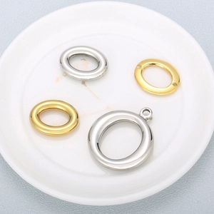 Polished stainless steel oval hollow pendants in gold and silver for DIY jewelry