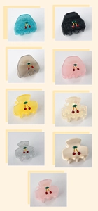 Détails de pinces à cheveux ornées de cerises en diverses finitions pastel pailletées