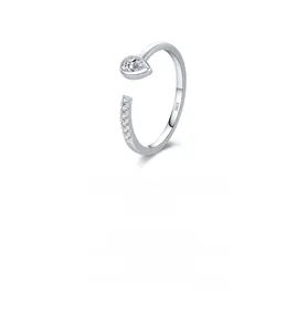 Detailed view of S925 sterling silver stamp and pear-cut crystal on an open ring