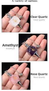 Macro detail of Cho Ku Rei crystal pendants in white, purple, and rose quartz stones