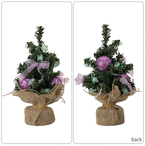 Front and back views of a mini artificial Christmas tree with purple baubles and burlap base