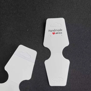 White adhesive folding display cards for hair accessories and necklaces with heart print