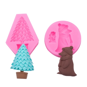 Pink silicone mold set for Christmas tree and penguin cake toppers and clay crafts