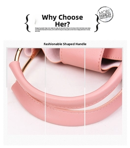 Detail of pink faux leather curved handle with gold metal rings on a stylish handbag