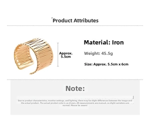Detail view of gold metal open cuff bracelet with woven texture and product dimensions