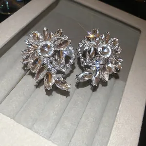 Exquisite silver floral stud earrings with sparkling marquise and round cut zircons