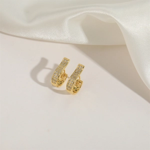 Elegant gold U-shaped hoop earrings featuring micro-paved clear cubic zirconia crystals