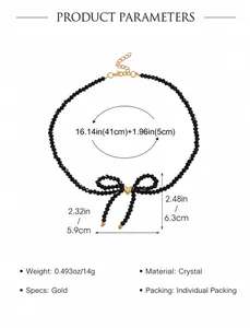 Detailed view of beaded bow necklace with gold heart center and measurement specifications
