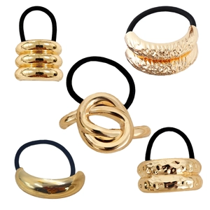 Punk style metallic gold elastic hair ties with diverse geometric textures and finishes