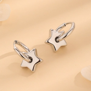 Polished stainless steel star dangle hoop earrings with a modern minimalist design