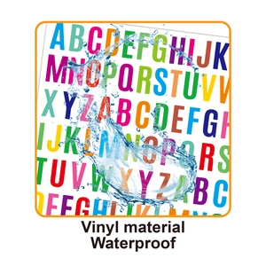 Macro shot showing splash of water on waterproof vinyl alphabet stickers for labeling