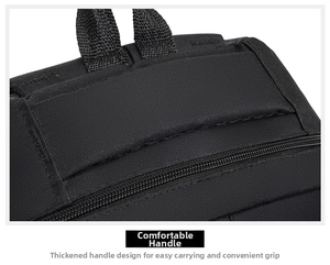 Detail shot of the reinforced padded top handle on the black nylon casual backpack