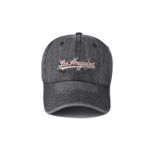 Close-up of vintage washed grey baseball cap with pink Los Angeles embroidery