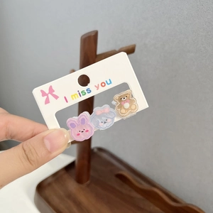 Set of 3 cartoon mini hair claws featuring cute purple rabbit and bears on a card
