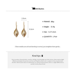 Detailed view of gold teardrop earrings showing 6.1cm x 1.5cm dimensions and size specs