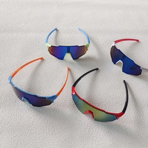 Kids sports cycling sunglasses with colorful lenses in four different color combinations