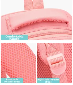 Detail of pink school bag featuring breathable mesh straps and comfortable handle