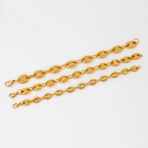 Three golden coffee bean link bracelets in various widths with lobster clasps on white background
