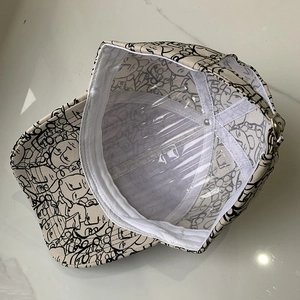 Detailed interior of graffiti baseball cap showing sweatband and shape support