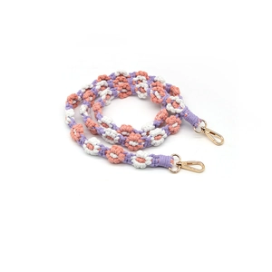 Handmade woven cotton flower strap with golden metal clasps in purple and pink