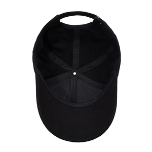 Interior view of black cotton baseball cap showing reinforced stitching and curved brim