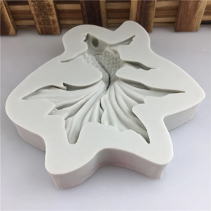 Detailed top view of a flexible silicone koi fish mold for fondant cake decorating