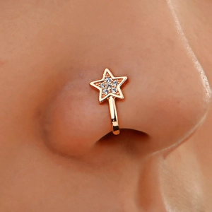 Rose gold star-shaped faux nose ring clip with white cubic zirconia in a U-shape