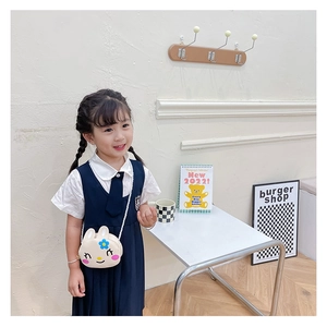 Toddler girl wearing cute white cartoon bunny crossbody bag with floral details