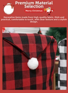 Detail of red and black buffalo plaid Christmas chair covers with white pom pom decor