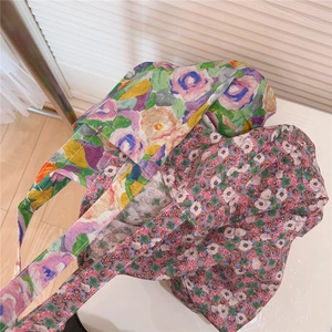 Detail of vintage floral print cotton tote bags with oil painting and small flower patterns