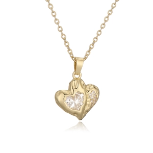 Golden double heart pendant necklace with zircon crystals on a clean white background