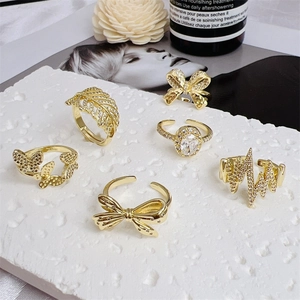 6-piece gold-plated adjustable ring set featuring butterfly, leaf, and zircon heart motifs