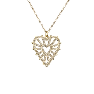 Gold hollow heart pendant necklace with micro-paved cubic zirconia and thorn edges
