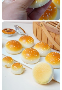 Detailed view of soft PU slow-rebound squishy buns with realistic sesame texture