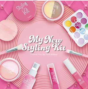 Detailed view of pink pretend play makeup kit featuring eye shadow and brushes