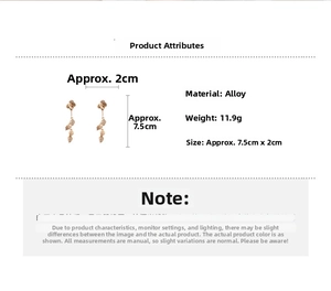 Detail of vintage gold flower and leaf tassel earrings showing dimensions of 7.5cm by 2cm