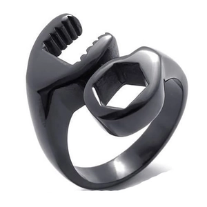 Macro view of black stainless steel wrench ring with industrial mechanical details