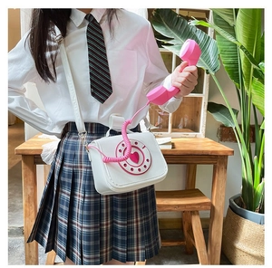 Creative white telephone crossbody bag with pink heart dial and handset decoration