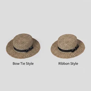 Handmade woven straw boater hats for women featuring elegant black satin ribbon and bows