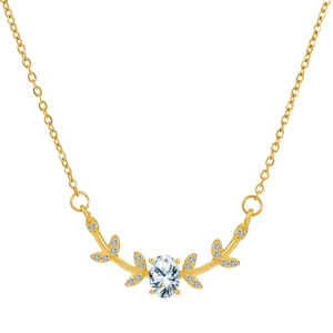 Detailed close-up of golden reindeer antler necklace with pearl and sparkling crystals